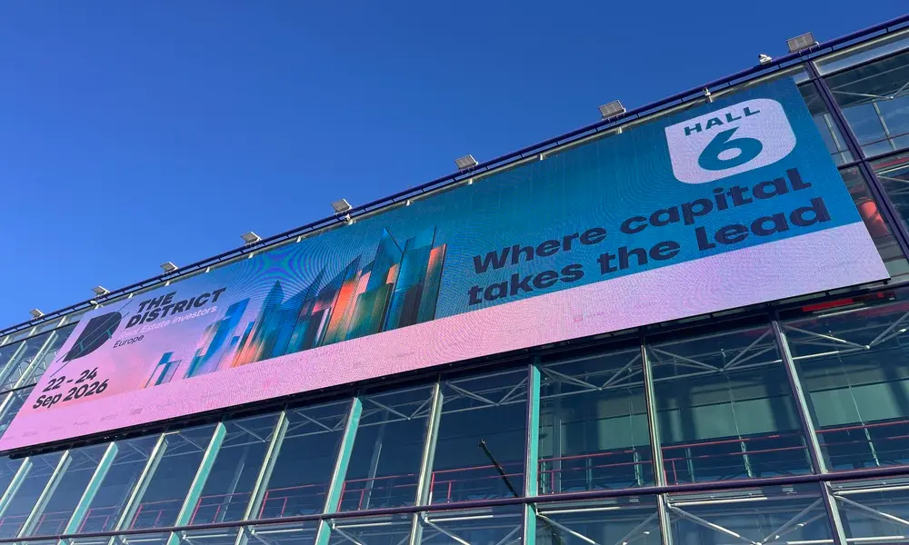 Fachada de The District 2026 en IFEMA Madrid, evento internacional de inversión inmobiliaria y real estate.
